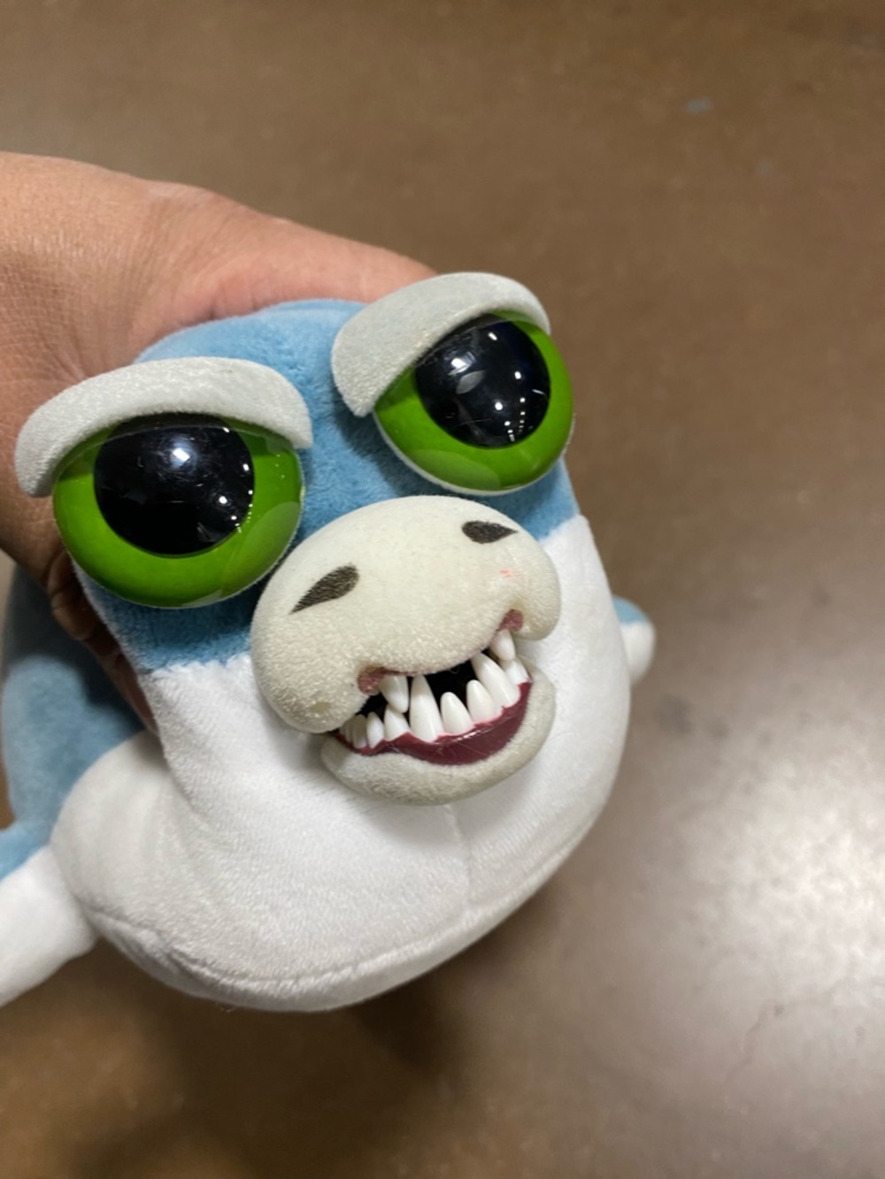 Blue and White Plush Shark with Green Eyes